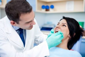 Dentist working on patient's teeth